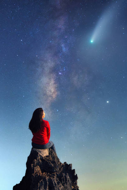 istock Milky Way and young woman. 1334773115