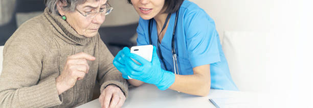 istock Grandmother 80 years old, does not understand how to communicate with a doctor. 1334774819