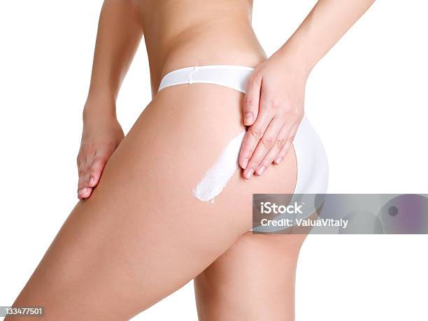 Female Applying Cosmetic Cream On Leg Stock Photo - Download Image Now - Moisturizer, Thigh - Human Leg, Cut Out