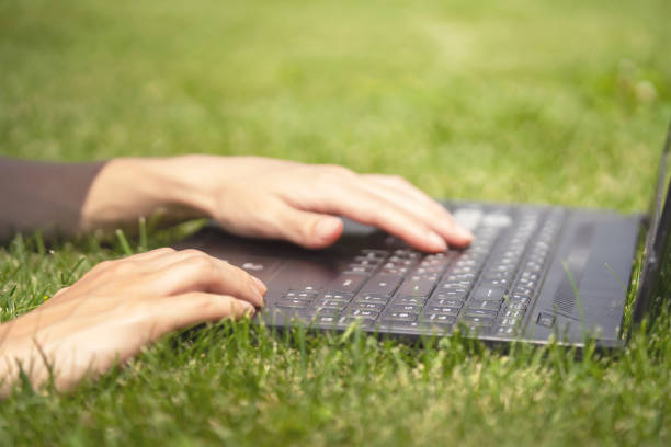 istock Female Hands are typing on the laptop keyboard. 1334775026