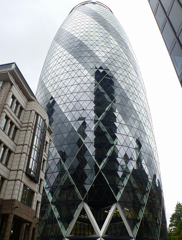 Gherkin, a modern skyscraper in the financial district of London, UK