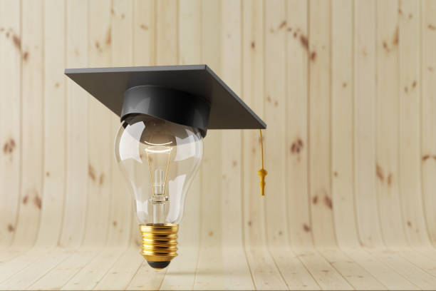 istock Light bulb with an academic hat on a wooden background. Ideas with innovative creativity for educational success explore the world. back to school. 3d render. 1334788167
