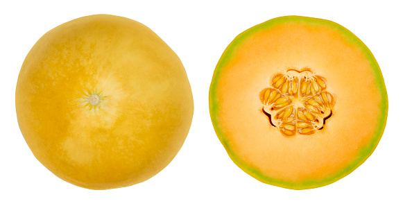 Honey Cantaloupe melon halves, isolated from above. Fresh and ripe fruit of a hybrid melon of the species Cucumis melo, a sweet, aromatic melon with orange fruit flesh and a smooth yellow rind. Photo.