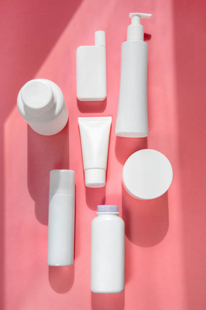 istock White tubes for cosmetics pink background flatley 1334797194