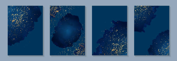 istock Watercolor background with abstract navy blue ink stains and golden splashes. 1334798443