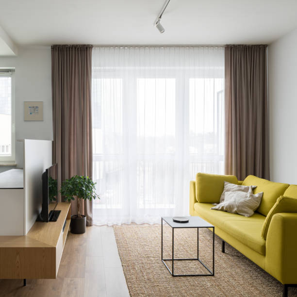 istock Modern living room with big window 1334800171