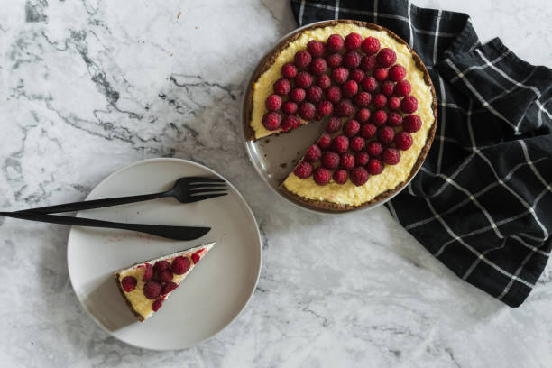 istock Delicious cheesecake with raspberries on plate, closeup 1334801915