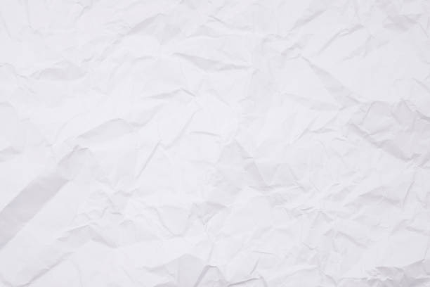istock Texture of white crumpled paper for background. 1334806653