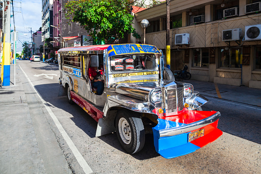Banaue,Philippines-October 18,2016: Typical jeepney of colors still circulating on the roads of cebu city on October 18, Cebu,Philippines.