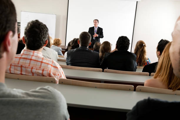 istock A professor teaching a business seminar to students 133480761
