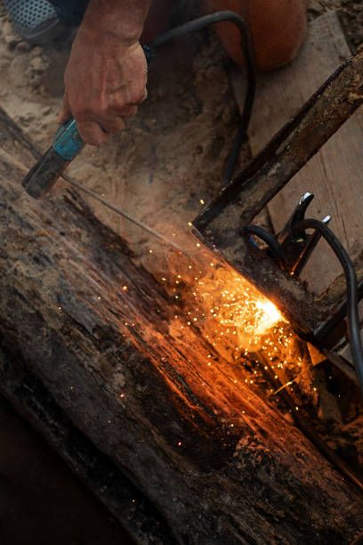 istock Top view of the worker,welding metal construction. 1334810459