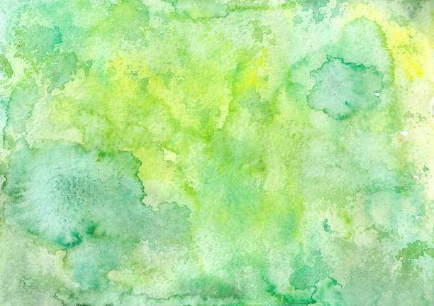 istock Bright watercolor green background. Hand-drawn backdrop. Abstract image of leaves. Colorful foliage. Blurry spots and drops of turquoise color. Raster illustration, artistic paint overlay. 1334812241