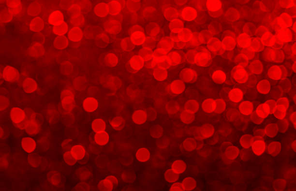 istock snow bokeh Backgrounds color red 1334814402