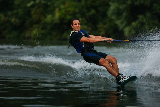 istock Wake-boarder surfing across a lake 1334817494