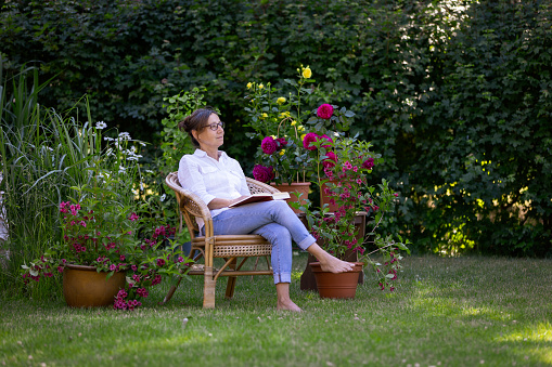 Woman enjoy relaxing in the garden
