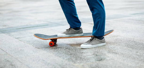 istock Skateboarder skateboarding outdoors in city 1334819056