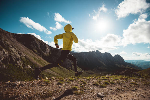 istock Woman ultramarathon runner running at mountain top 1334820139