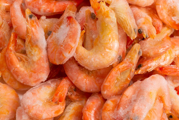 istock Fresh shrimps in ice. Top view. 1334820782