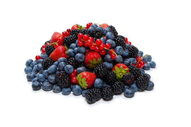 istock Blackberry, raspberry, blueberry,  red currant and mint background. 1334820805