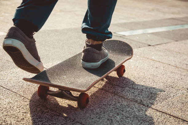 istock Skateboarder riding on skateboard outdoors in city 1334822215