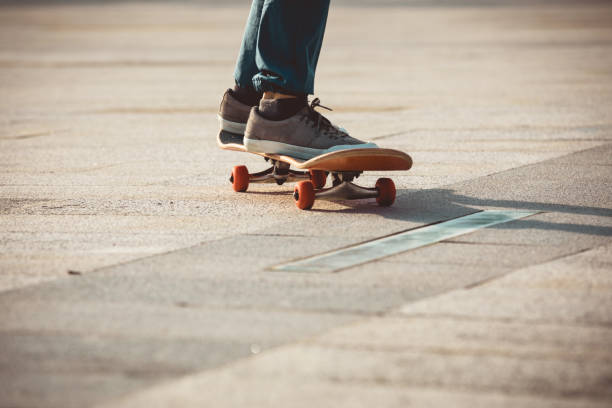 istock Skateboarder riding on skateboard outdoors in city 1334822319