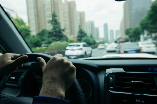 istock Driving car in modern city 1334823677