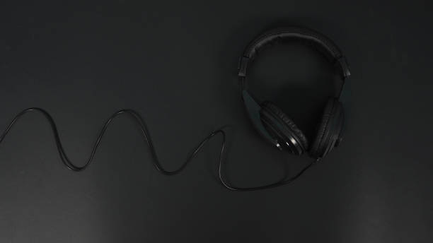 Headphones isolated on black background.