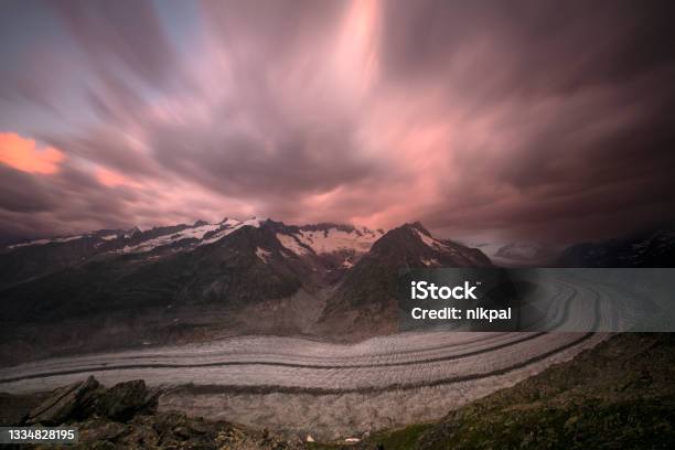 The Aletsch Glacier Seen From The Eggishorn With Thunderstorm At Sunrise Switzerland Stock Photo - Download Image Now