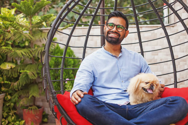 istock Indian dog owner 1334828615