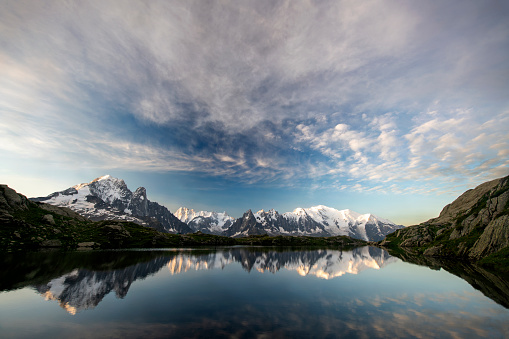 the Cheserys lake with mount blanc mountain range on the background at Sunrise - France