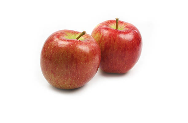 Braeburn apples on white background stock photo