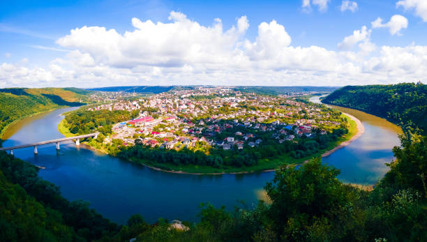 istock City on a peninsula surrounded by a large river. Sunny summer landscape. 1334829697