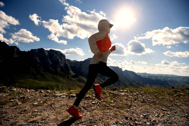 istock Young woman ultramarathon runner running at mountain top 1334829736