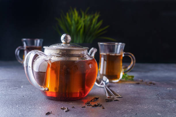 istock Black tea in a clear glass teapot 1334831190