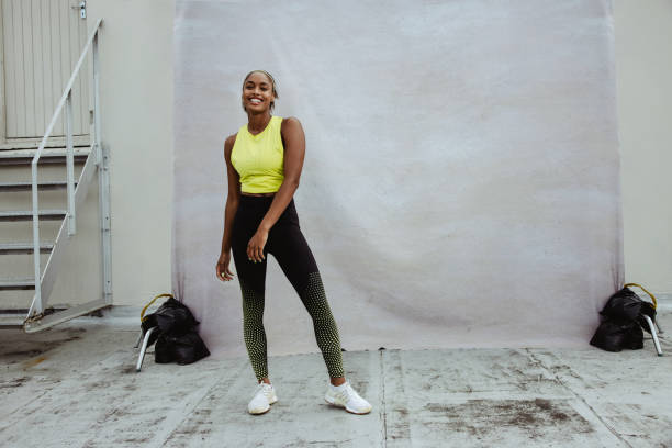 istock African sportswoman standing on rooftop 1334831969