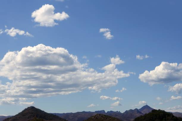 istock Blue sky white clouds in a summer clean day 1334834631
