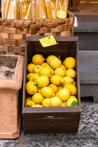 istock A wooden box with fresh lemons 1334835378