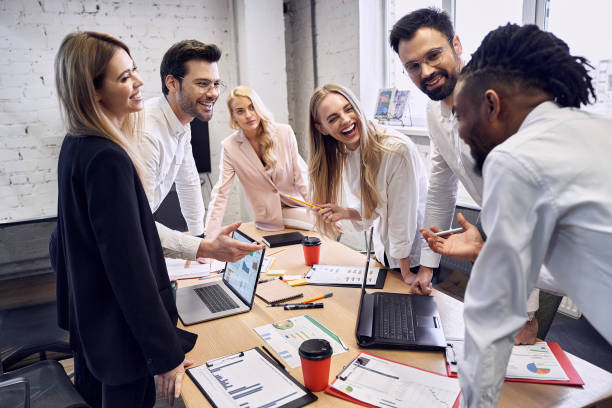 istock Concentrated business people communicating with each other while working together in the board room 1334835388