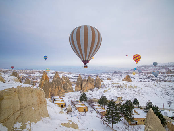 istock Hot air balloons flying over Cappadocia 1334837342