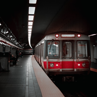 Boston redline subway car pulling into station