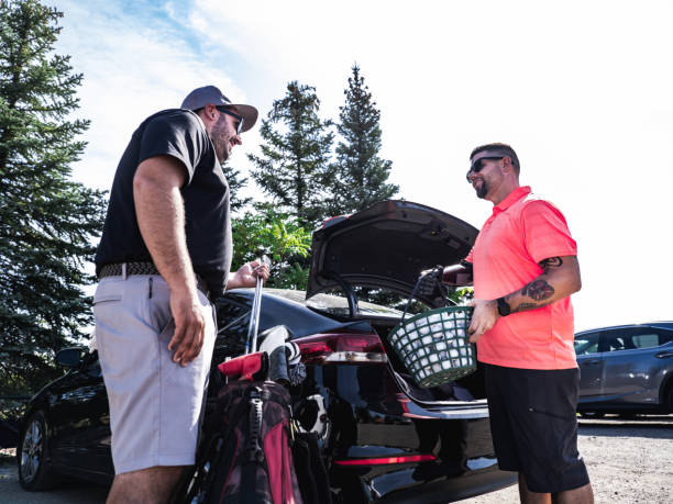 istock Arm amputee and his coach before golf practice 1334838400