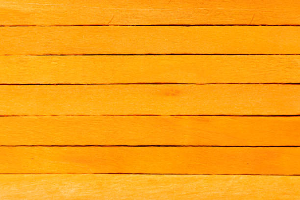 istock Orange color wood plank use as textured background, frame, decoration with copy space 1334846913