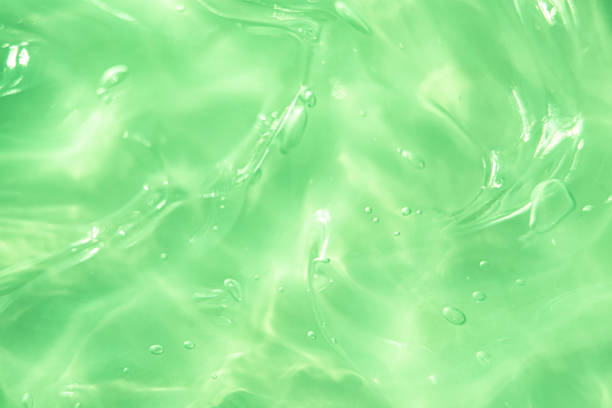 istock Green water Aloe Vera gel smudged texture 1334848475