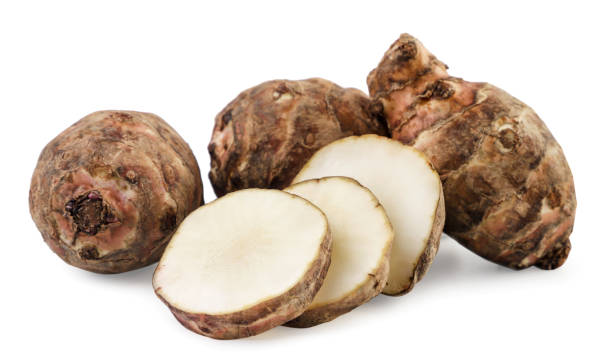 istock Jerusalem artichoke whole and slices on a white background. Isolated 1334850052