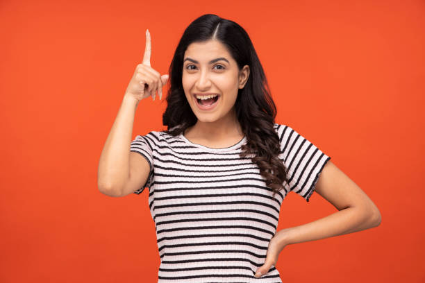 istock Young woman on yellow background 1334852929