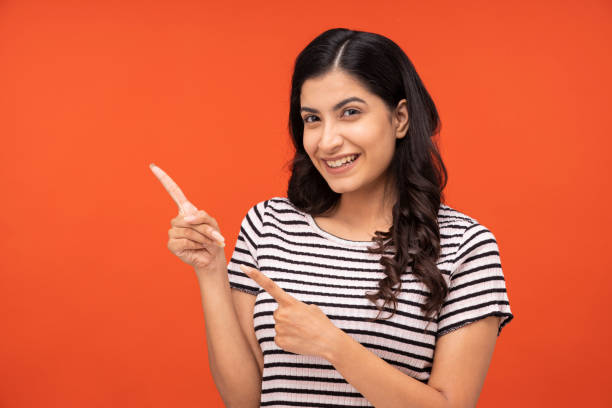 istock Young woman on yellow background 1334853331