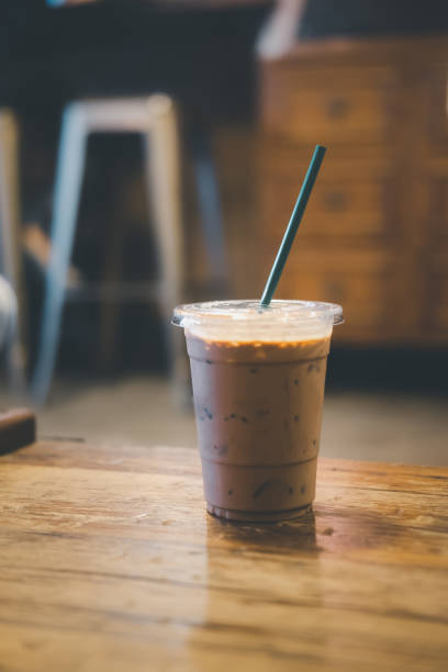 istock Cold Mocha coffee drink in a take away glass. Close up 1334854136