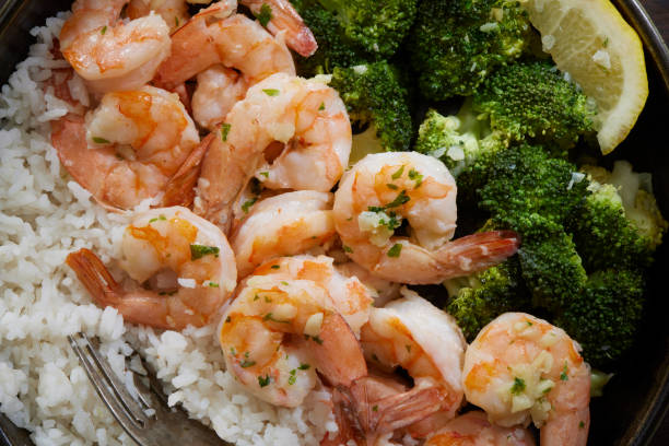 istock Shrimp and Rice Bowl with Steamed Broccoli 1334854659