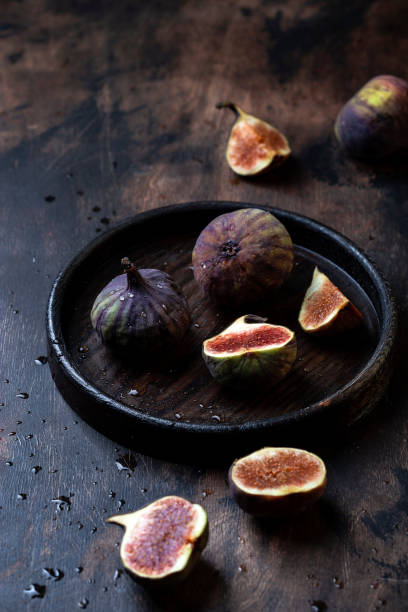 istock A few figs in a bowl on a wooden background 1334855010