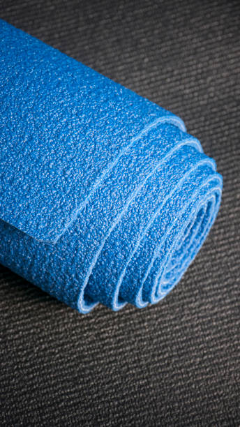 istock Rolled up blue yoga mat 1334865004